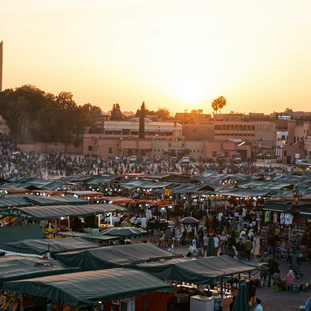 wide-angle photography of people gathering near outdoor during daytime